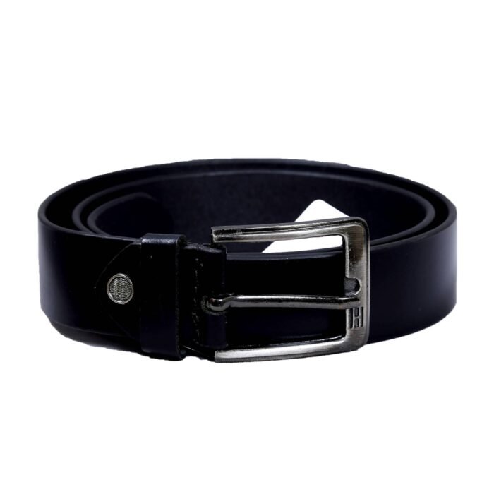 Tommy Hilfiger Black Color Leather Belt1 <div class="woocommerce-product-details__short-description"><strong>Belt Buckle:</strong> This is the hardware component, often made of metal, that secures the belt in place. Buckles can range from simple and minimalistic to ornate and decorative, with different shapes like square, oval, or horseshoe.</div> <div class="woocommerce-product-details__short-description"> <strong>Belt Holes:</strong> These are the evenly spaced perforations along one end of the belt, allowing you to adjust the fit by inserting the buckle's prong through the appropriate hole.</div> <div class="woocommerce-product-details__short-description"> <strong>Belt Width:</strong> Leather belts come in various widths, typically ranging from 1 to 2 inches. Narrower belts are often more formal, while wider belts are commonly used in casual or workwear settings.</div> <div class="woocommerce-product-details__short-description"> <strong>Stitching:</strong> Many leather belts feature stitching along the edges to enhance durability and add visual detail. The thread color can contrast or match the leather, depending on the design.</div>