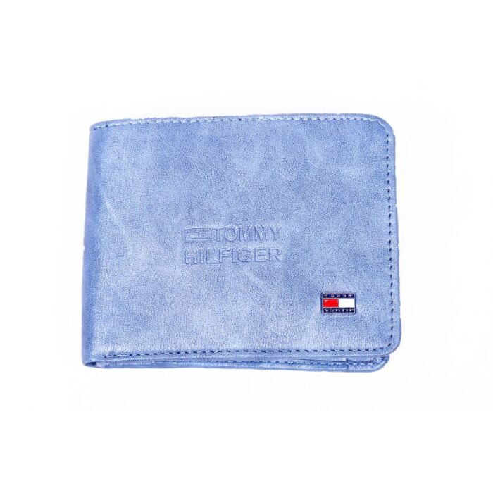 Tommy Hilfiger blue Color Leather Wallet <div class="woocommerce-product-details__short-description"> <strong>Material:</strong> The pocket is constructed from leather, which can vary in texture, thickness, and color.The leather can be smooth, pebbled, embossed, or treated to create a specific finish. <strong>Functional Uses:</strong> Leather pockets serve a variety of functional purposes, such as storing personal items, holding tools or gadgets, or providing quick access to small items. They are often found on jackets, where they might hold a wallet or phone, or on bags, where they can keep items organized. <strong>Decorative Uses:</strong> In addition to their functional role, leather pockets can be used as decorative elements. For example, a leather pocket on a jacket or coat can add a rugged or stylish flair. On bags or accessories, leather pockets can serve as a design feature that enhances the overall look. </div>