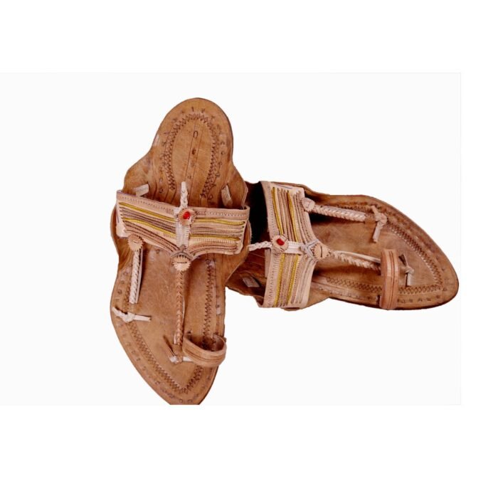 light brown Leather Chappal For Men 2 <div class="woocommerce-product-details__short-description"> <strong>Material:</strong> The leather used in these chappals is typically cowhide, goatskin, or buffalo leather. It is tanned and treated for durability and flexibility. <strong>Comfort:</strong> Chappals are designed for comfort and ease of use. The flat soles and open design allow for breathability and freedom of movement. The leather straps typically soften with use, molding to the shape of the foot for a more customized fit. <strong>Versatility:</strong> Leather chappals are versatile and can be worn with a variety of outfits, from traditional ethnic wear like sarees and salwar kameez to casual jeans or skirts. They are suitable for everyday wear as well as special occasions. </div>